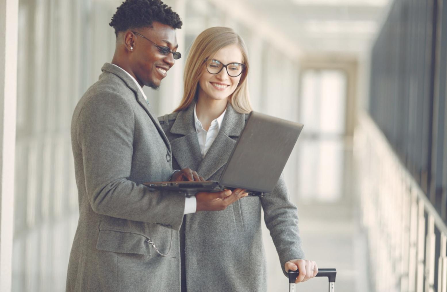 Person reviewing financial documents and planning budget at desk